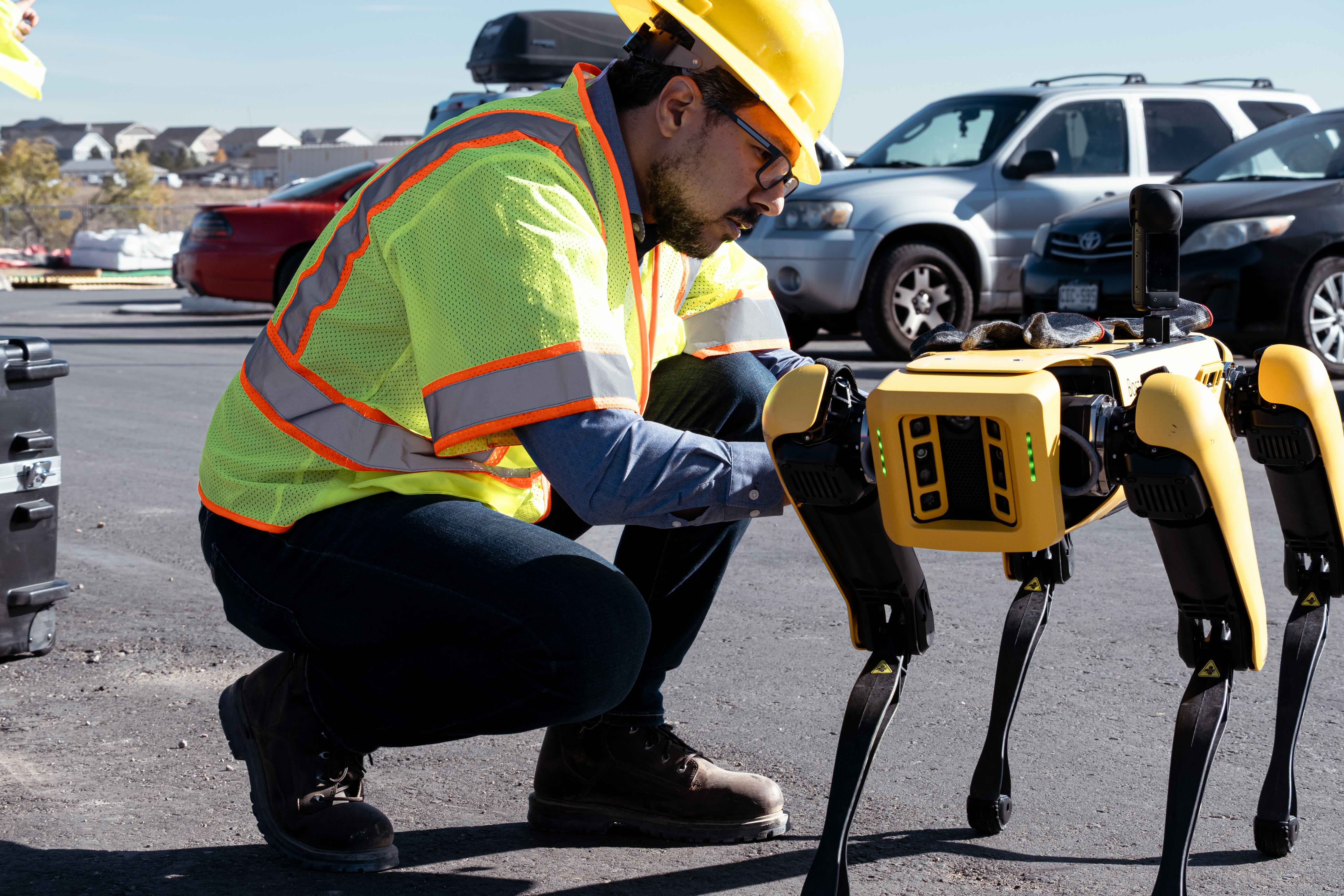 Contsruction professor with ATLAS SPOT dog technology