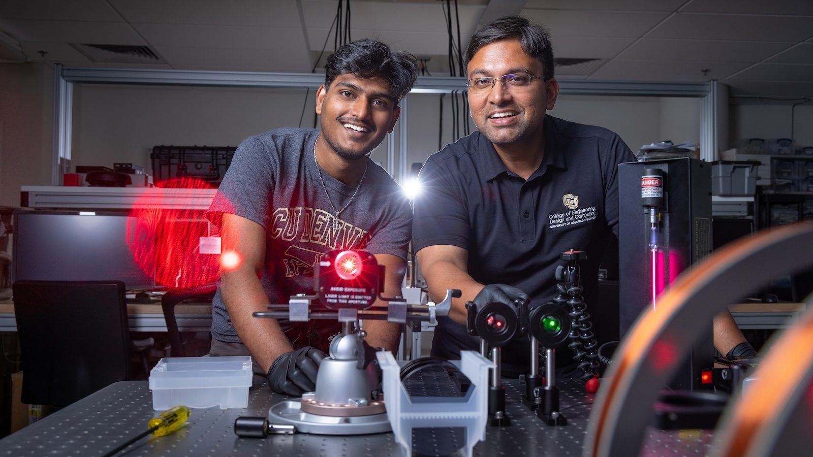 Graduate student Kalyan Tirumalasetty (left) and Assistant Professor of Electrical Engineering Aakash Sahai work on their quantum technology in a lab.