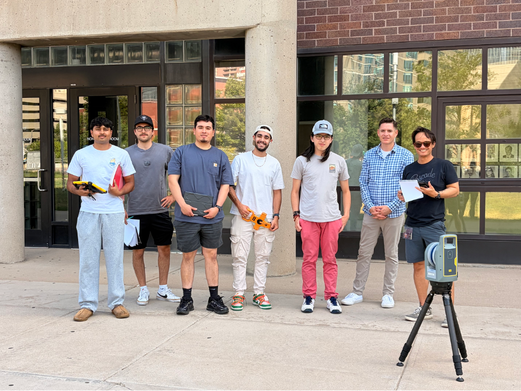 Summer 2026 CVEN 2215 students with the Trimble X9 terrestrial laser scanner on the Auraria Campus.